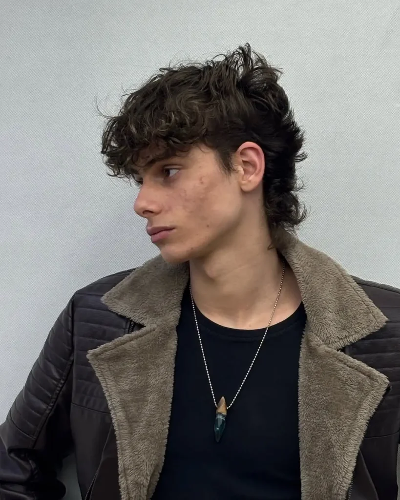 modern mullet fade wavy hair